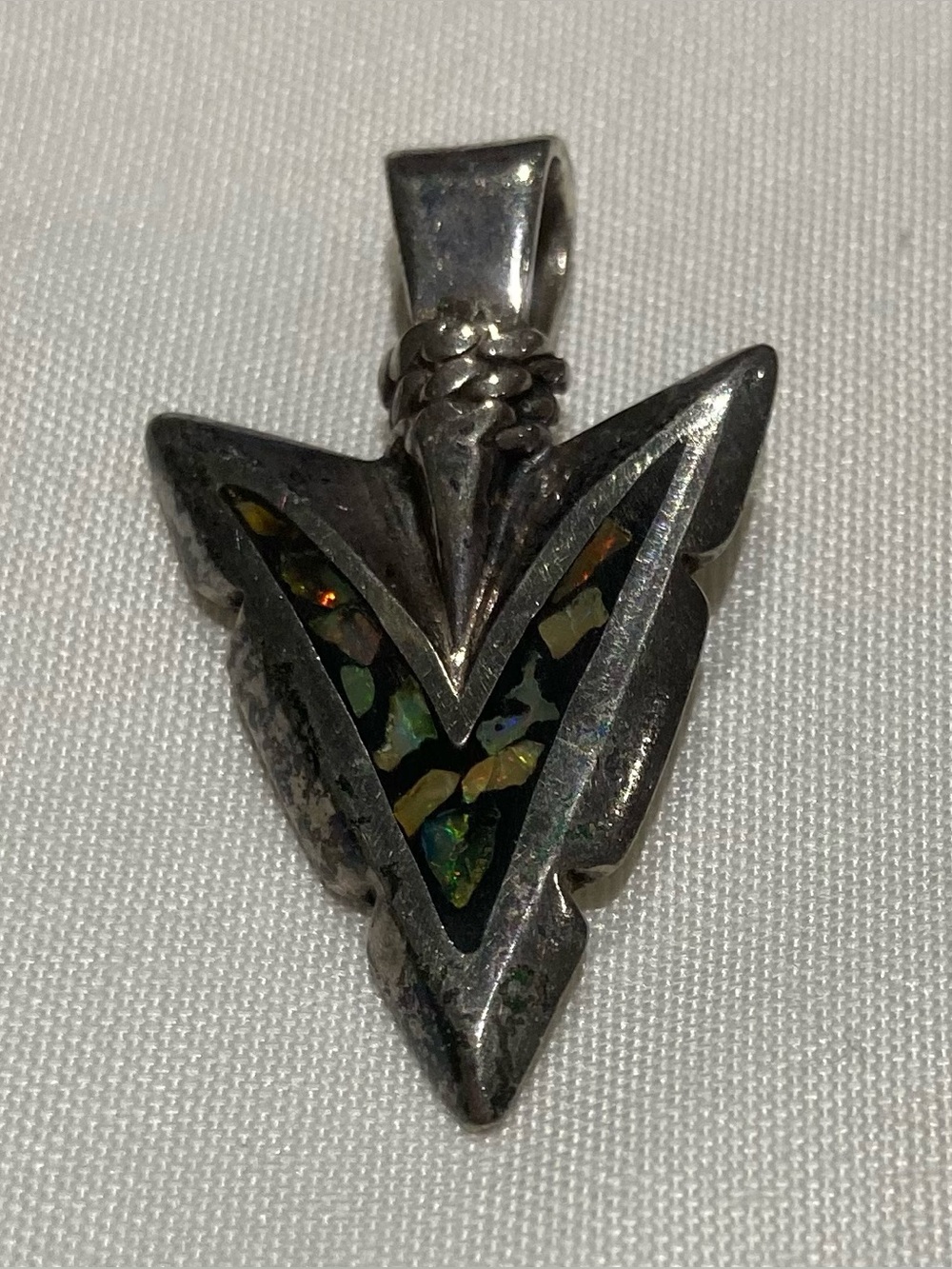 Silver-tone Arrowhead Pendant with Iridescent Inlay - Green Accent